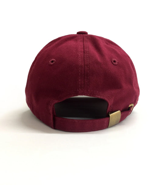 Maroon baseball cap with a gold adjustable strap on a white background