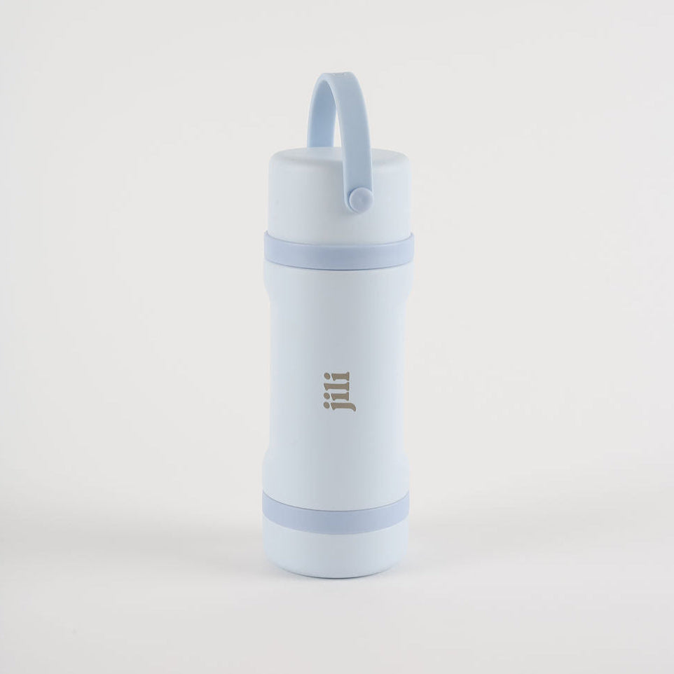 Light blue water bottle with a strap on a white background