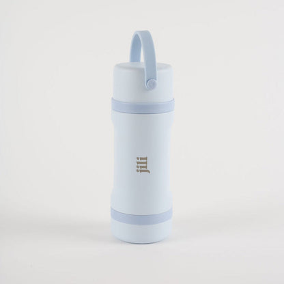 Light blue water bottle with a strap on a white background