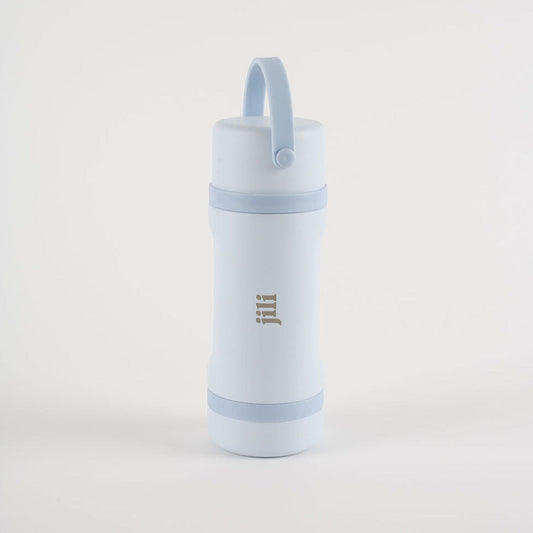 Light blue water bottle with a strap on a white background
