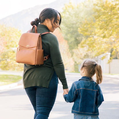 Mom with Freshly Picked butterscotch vegan leather mini diaper bag backpack with front pocket