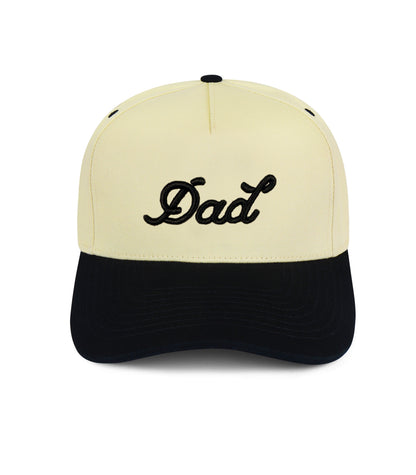 Beige and black cap with 'Dad' text on a white background Shop Dad Brand at Our Heyday