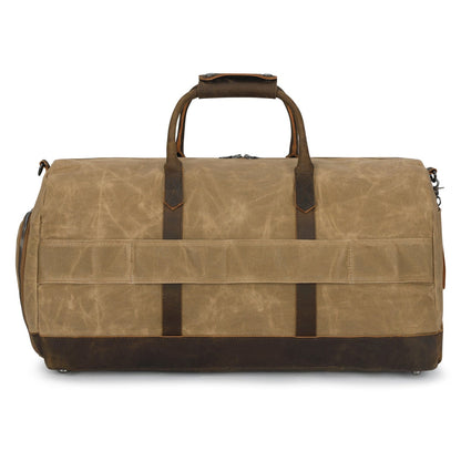 Brown duffel bag with leather straps on a white background