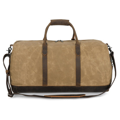 Brown duffel bag with leather straps on a white background