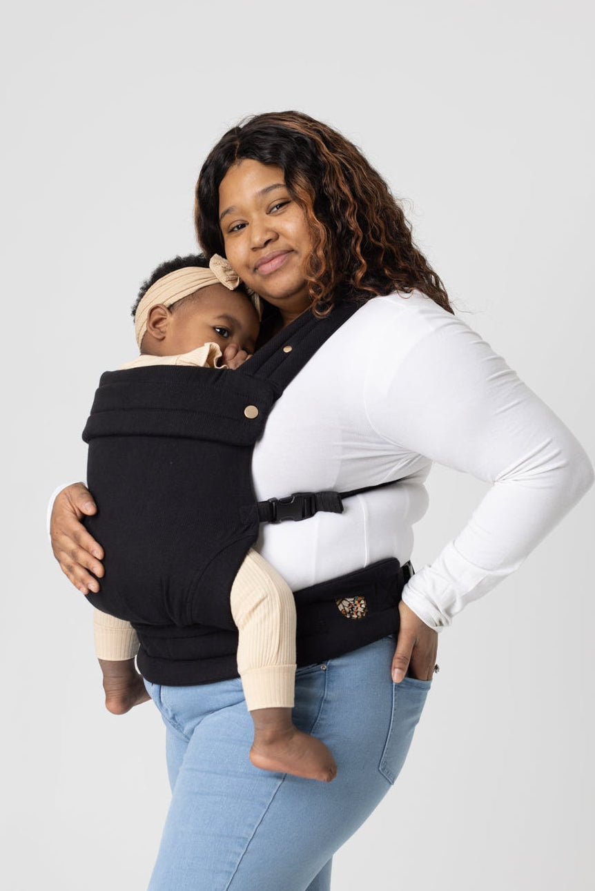 Mabē Monarch ergonomic baby carrier in solid ebony black cotton linen jacquard fabric