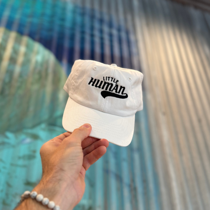 LITTLE HUMAN CAP