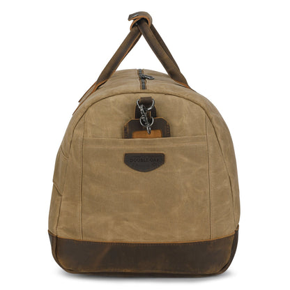 Brown duffel bag with leather accents on a white background