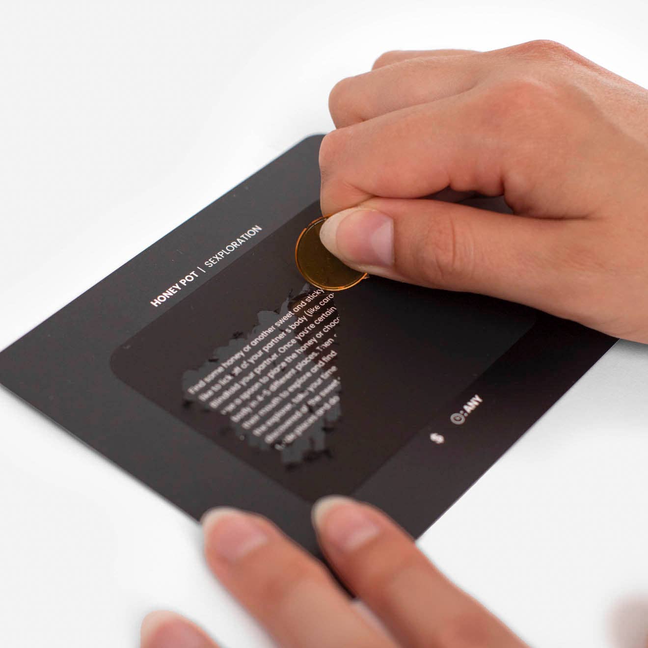 Sexy Couples Game box with 30 scratch-off date night challenges for couples.