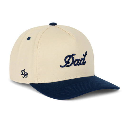 Cream and Navy Dad Brand hat available at Our Heyday