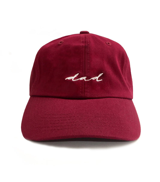 Dad Brand maroon 6-panel dad hat with white cursive embroidery on cotton