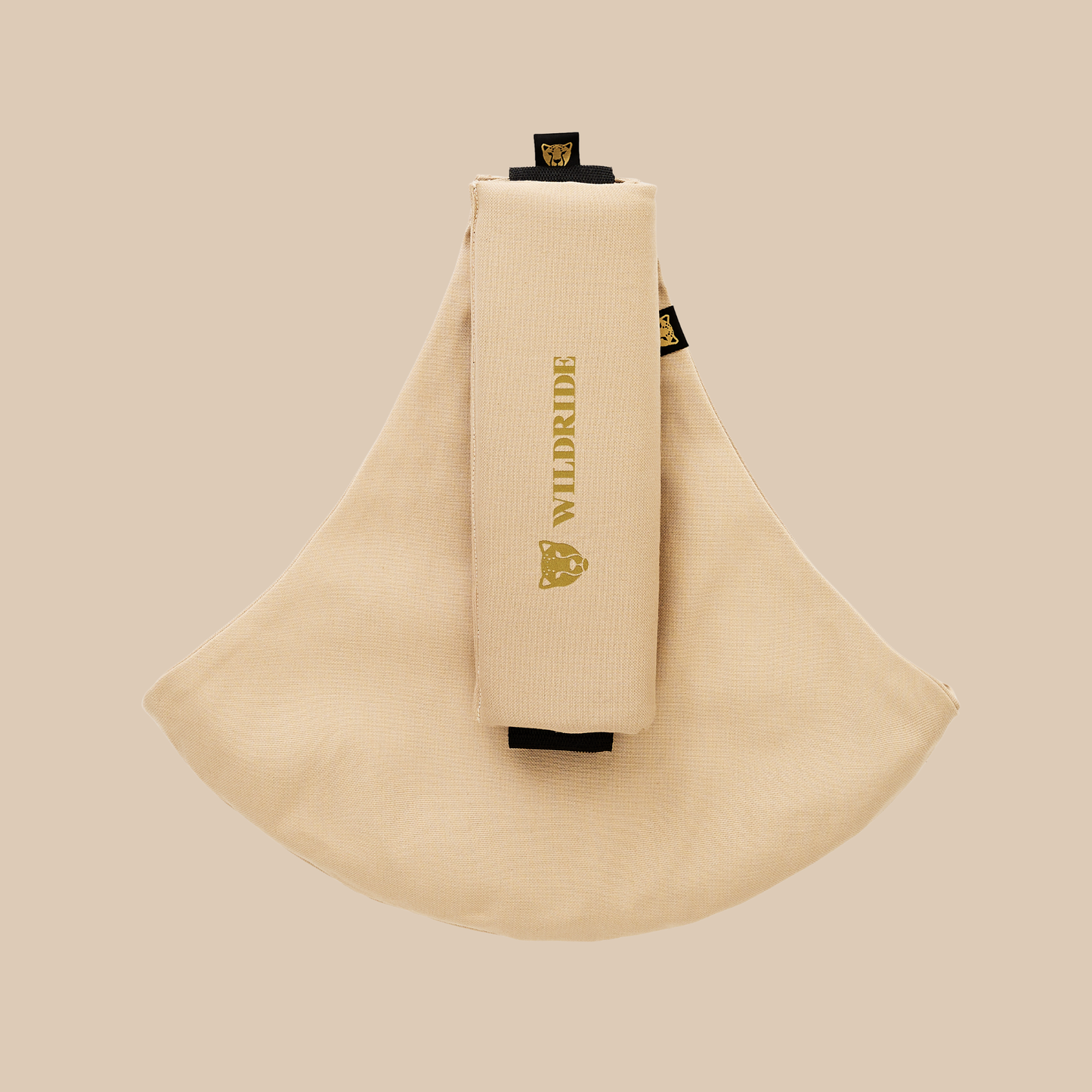 Wildride USA toddler hip carrier in beige, 100% cotton, compact foldable design