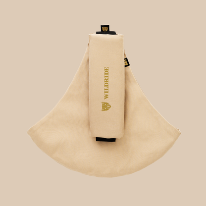 Wildride USA toddler hip carrier in beige, 100% cotton, compact foldable design
