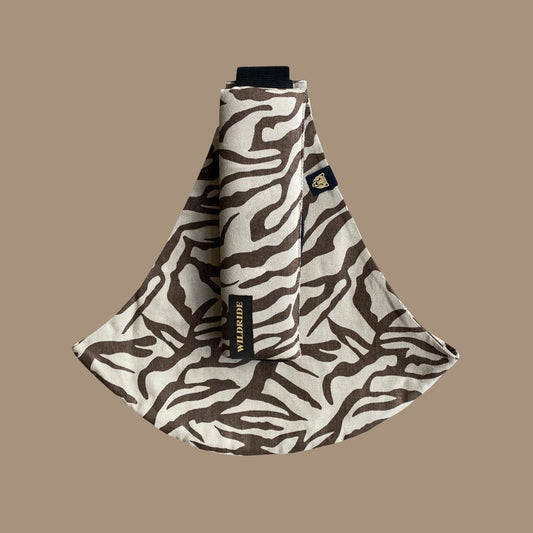 Wildride toddler hip seat carrier in brown zebra print cotton fabric